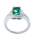 The semilateral view of this cushion cut emerald ring shows the top and gallery profile.