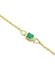 14K yellow gold solitaire bracelet with a deep green Colombian emerald.
