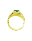 Gold men's emerald ring displaying the top setting and plain lateral view.