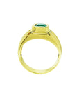 Men's 14K yellow gold solitaire ring with a bezel-set deep green Colombian emerald.