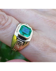 A 14k yellow gold men’s ring featuring a square emerald-cut natural Colombian emerald, bezel-set for a sleek and refined look.