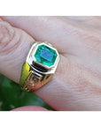 A 14k yellow gold men’s ring featuring a square emerald-cut natural Colombian emerald, bezel-set for a sleek and refined look.