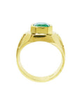 Men's 14K gold solitaire ring with a bezel-set 3.16 ct Colombian emerald and Greek Key design.