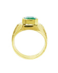 Men's 14K gold solitaire ring with a bezel-set 3.16 ct Colombian emerald and Greek Key design.