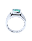 Men's 18K white gold solitaire ring with a bezel-set, rectangular Muzo emerald.