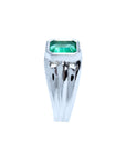 The top and side profile view of this white gold emerald ring for man.