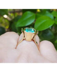 2.14 ct. rectangular Colombian emerald solitaire ring, bezel set in 14K yellow gold.
