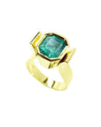 2.14 ct. rectangular emerald-cut Colombian emerald solitaire ring bezel set in 14K yellow gold.