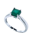 1.00 ct. Colombian emerald solitaire silver ring with a square emerald cut gemstone in a four-prong setting.