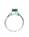 Colombian emerald solitaire silver ring with a square emerald cut gemstone in a four-prong setting.