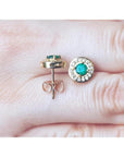 14k yellow gold emerald halo diamond stud earrings, round deep bluish-green emeralds.