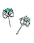 Pair of 14k gold emerald tulip stud earrings, underside view.