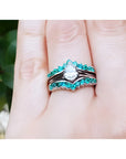 14k white gold ring enhancer with 0.76 ct. emeralds, designed to frame a pear-shaped solitaire.