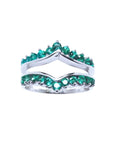 This enhancer emerald ring displays the topside detailed two rows of natural emeralds round cut.