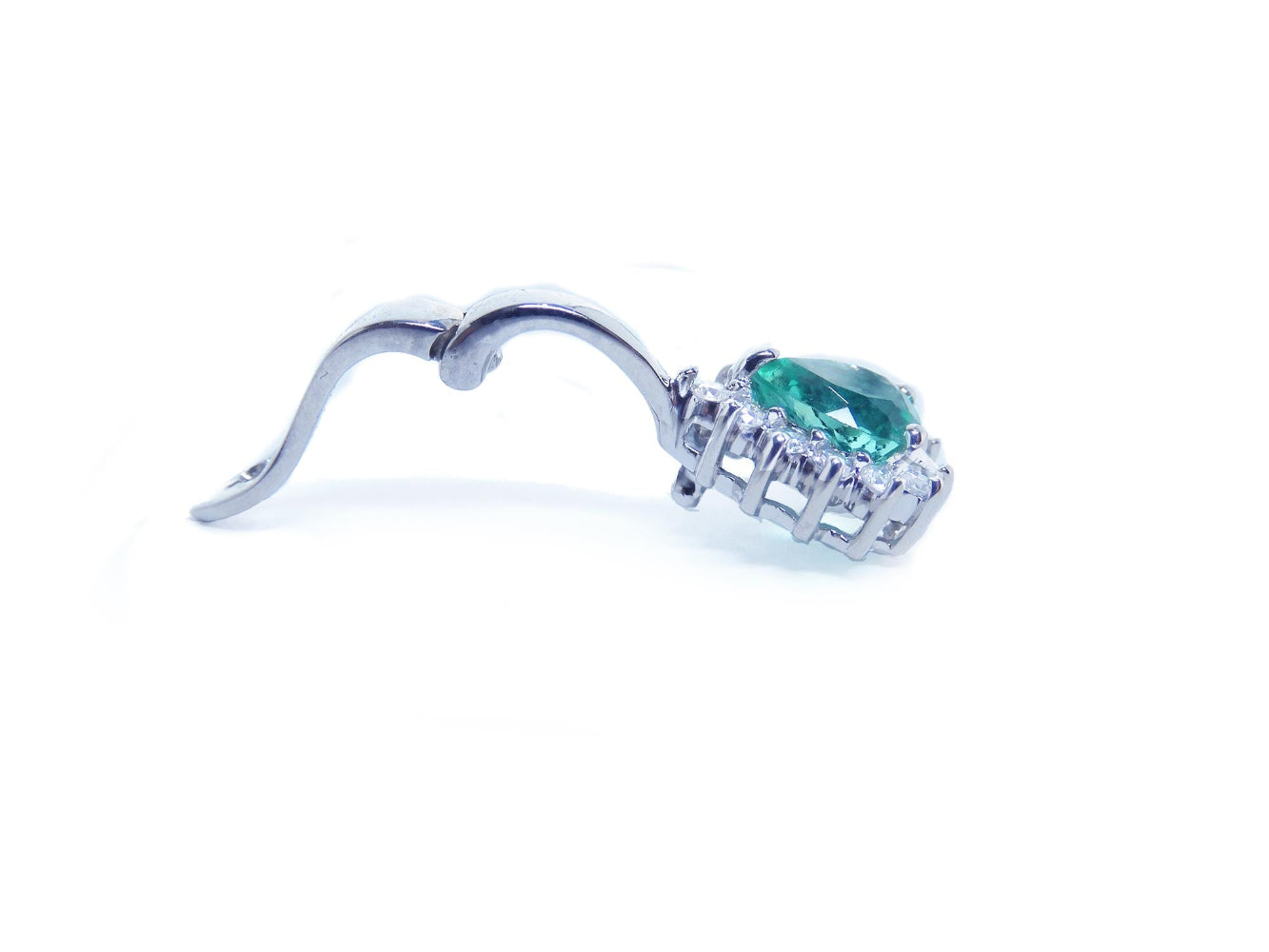 This graphic displays the underside view of a Colombian emerald enhancer pendant in open mode.