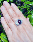 Men's sterling silver ring with a fiery red, green, and blue Ethiopian black opal.