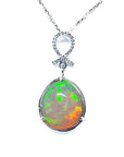 Ethiopian Welo opal pendant with multicolor shimmer, diamond bail, and 14K white gold chain.