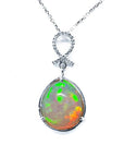 Ethiopian Welo opal pendant with multicolor shimmer, diamond bail, and 14K white gold chain.