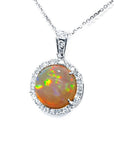 Ethiopian Welo opal pendant with red flashes, diamond halo, and 14K white gold chain.