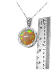 Ethiopian Welo opal pendant with red flashes, diamond halo, and 14K white gold chain.