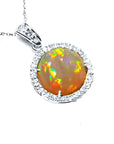 Ethiopian Welo opal pendant with red flashes, diamond halo, and 14K white gold chain.