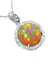 Ethiopian Welo opal pendant with red flashes, diamond halo, and 14K white gold chain.