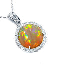 Ethiopian Welo opal pendant with red flashes, diamond halo, and 14K white gold chain.