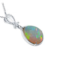 7.76 ct. Ethiopian Welo Opal and Diamond Pendant in 14K White Gold, featuring a multicolor oval opal.