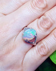 Ethiopian opal sterling silver ring for women with oval cut, red and orange play of color.
