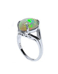Ethiopian opal sterling silver ring for women, oval cut, with vibrant red and orange play of color.