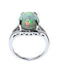 Ethiopian opal sterling silver ring for women, oval cut, with red and orange play of color.