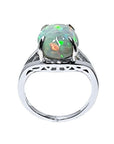 Ethiopian opal sterling silver ring for women, oval cut, with red and orange play of color.