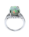 Ethiopian opal sterling silver ring for women, oval cut, with red and orange play of color.