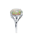 Ethiopian opal sterling silver ring for women with an oval cut, showing red, orange, and green play of color.