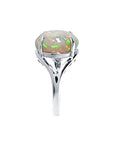 Ethiopian opal sterling silver ring for women with an oval cut, showing red, orange, and green play of color.
