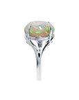 Ethiopian opal sterling silver ring for women with an oval cut, showing red, orange, and green play of color.