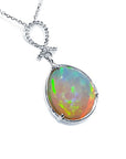 7.76 ct. Ethiopian Welo Opal and Diamond Pendant in 14K White Gold, featuring a pear-shaped opal with multicolor shimmer.
