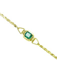 14K yellow gold solitaire bracelet with a deep green Colombian emerald.