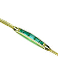 14K gold bracelet with five vibrant Muzo emeralds and sparkling diamonds.