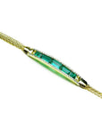 14K gold bracelet with five vibrant Muzo emeralds and sparkling diamonds.