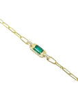 14K yellow gold paper clip bracelet with a rectangular emerald and diamond accents.