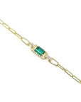 14K yellow gold paper clip bracelet with a rectangular emerald and diamond accents.