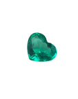Heart cut loose natural colombian emerald premium loose gem with a rich bluish-green color.