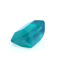 Untreated 3.98 ct loose emerald from Muzo Mines, vibrant bluish medium-deep green, emerald cut.