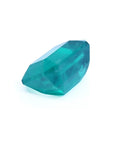 Untreated 3.98 ct loose emerald from Muzo Mines, vibrant bluish medium-deep green, emerald cut.