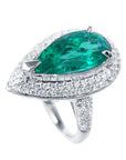 Anillo de oro blanco con esmeralda corte de pera y diamantes para dama