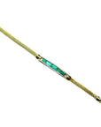 14K gold bracelet with five vibrant bluish-green emeralds and diamonds.