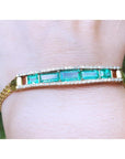 A five stone emerald bracelet natural Colombian emeralds fine quality made of 18k yellow gold for women.