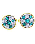 Pair of natural emerald cufflinks with accent diamonds in 14k yellow gold on a topside display.