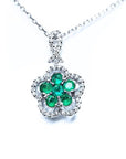 14K white gold emerald cluster necklace with five petals, surrounded by diamonds.